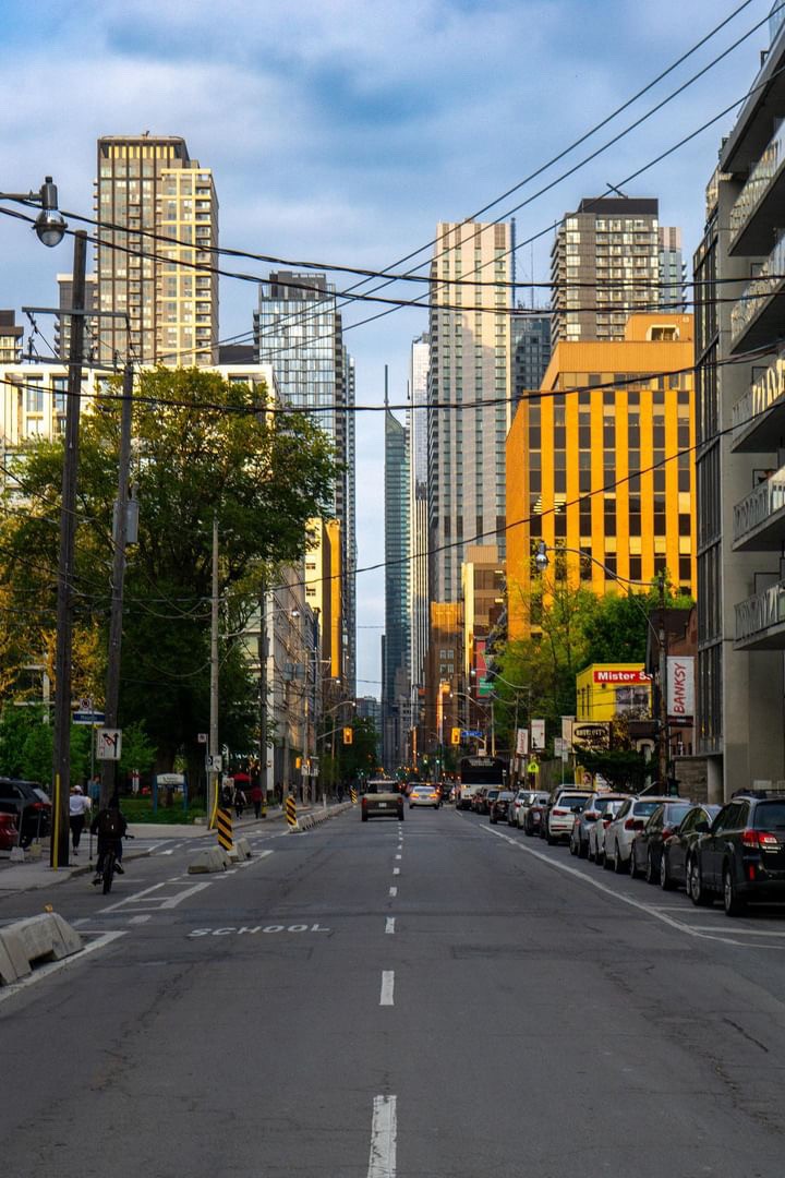 City street with skyscrapers in the distance