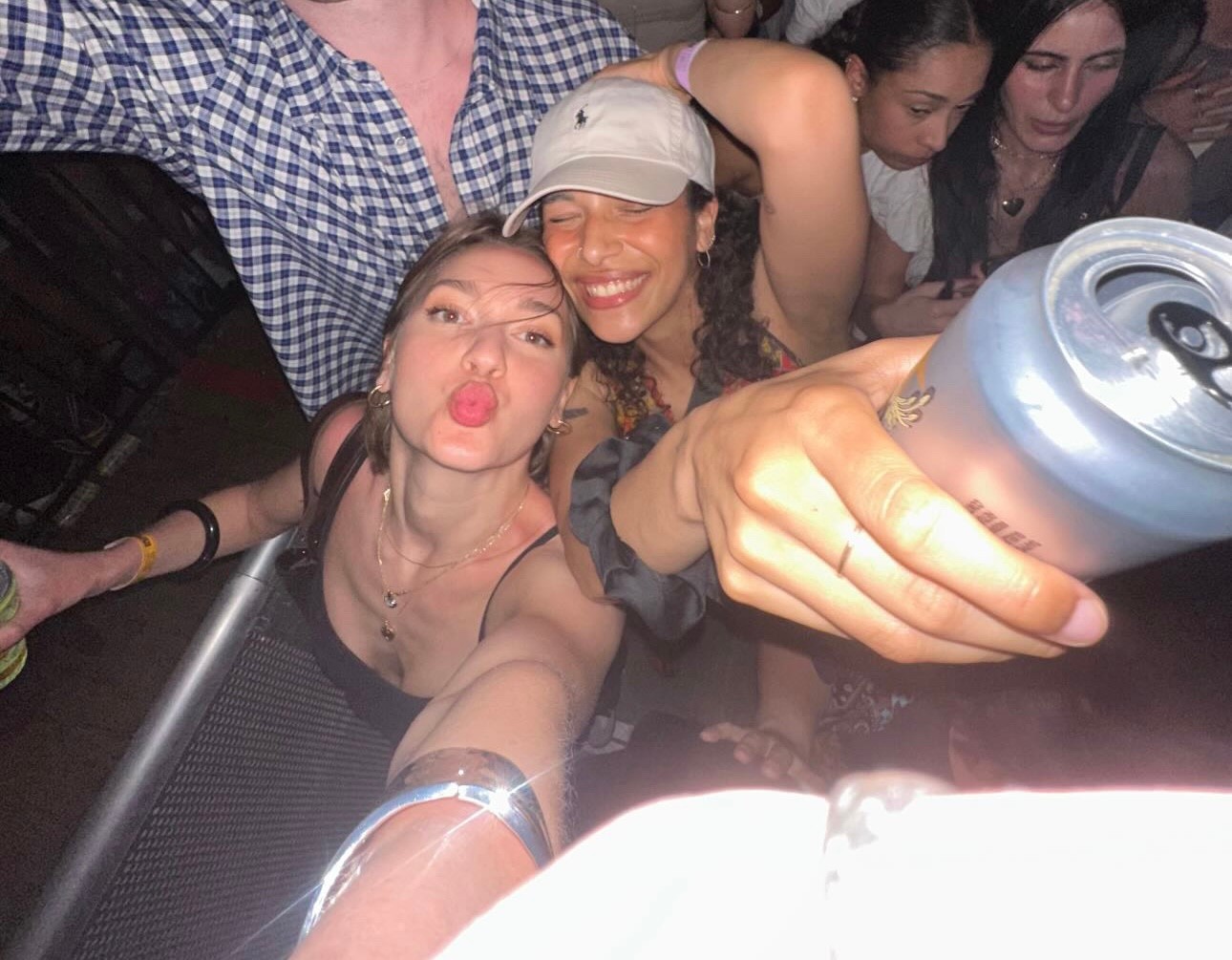 Two girls taking a selfie at a party